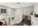 Upstairs loft area with hardwood floors, mini fridge and natural light at 334 E Neal Ave, Las Vegas, NV 89183