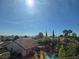Nice backyard view with pool, landscaping, and surrounding views of the city and mountains at 3440 Crystal Tower St, Las Vegas, NV 89129