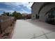 Spacious backyard featuring a concrete patio and secure fencing at 3440 Crystal Tower St, Las Vegas, NV 89129