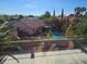 Beautiful backyard with pool, landscaping, and view of the city and mountains at 3440 Crystal Tower St, Las Vegas, NV 89129