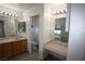 Bright bathroom featuring dual sinks, vanity lighting, and separate toilet and shower areas at 3440 Crystal Tower St, Las Vegas, NV 89129