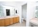 A spacious bathroom showcasing a double vanity, glass shower and access to a private toilet room at 3440 Crystal Tower St, Las Vegas, NV 89129
