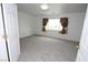 Bedroom with plush carpeting features a window view and neutral paint at 3440 Crystal Tower St, Las Vegas, NV 89129