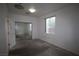 Bedroom featuring carpet, a window, and a sliding door closet at 3440 Crystal Tower St, Las Vegas, NV 89129