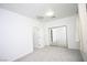 Bedroom featuring carpet floors, neutral walls, closet with mirrored doors and bright window at 3440 Crystal Tower St, Las Vegas, NV 89129