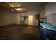 View of the two-car garage featuring built-in storage and interior access at 3440 Crystal Tower St, Las Vegas, NV 89129