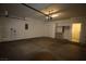 View of the two-car garage featuring additional storage cabinets and interior access door at 3440 Crystal Tower St, Las Vegas, NV 89129