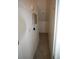 Narrow hallway with plank tile floors, light fixture, and fuse box at 3440 Crystal Tower St, Las Vegas, NV 89129