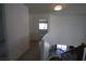 A hallway showcasing the staircase and access to other rooms at 3440 Crystal Tower St, Las Vegas, NV 89129