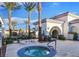 Inviting hot tub with clear blue water, surrounded by palm trees and comfortable lounge seating, great for relaxing at 3440 Crystal Tower St, Las Vegas, NV 89129