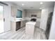 Cozy eat-in kitchen with stainless appliances, island and a sliding glass doors at 3440 Crystal Tower St, Las Vegas, NV 89129