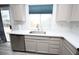 Bright kitchen with quartz countertops and stainless steel appliances at 3440 Crystal Tower St, Las Vegas, NV 89129