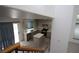 View of kitchen features stainless steel appliances, island, stone countertops, and patio access at 3440 Crystal Tower St, Las Vegas, NV 89129