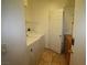 Neat laundry room with washer, dryer, and storage shelf space at 3440 Crystal Tower St, Las Vegas, NV 89129