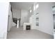 Living room featuring a fireplace, herringbone floors, and staircase at 3440 Crystal Tower St, Las Vegas, NV 89129
