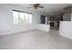 Spacious living room with tile floors and large windows offer plenty of natural light at 3440 Crystal Tower St, Las Vegas, NV 89129