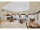 Spacious meeting room featuring tables, chairs, fireplace, and large windows, suitable for gatherings and events at 3440 Crystal Tower St, Las Vegas, NV 89129