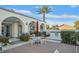 Inviting outdoor kitchen and dining area with built-in grill, table and chairs, ideal for entertaining and outdoor cooking at 3440 Crystal Tower St, Las Vegas, NV 89129