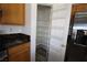 Walk-in pantry with built-in shelving in the kitchen area at 3440 Crystal Tower St, Las Vegas, NV 89129