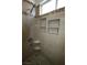 Close-up of tile shower featuring tiled storage cubbies and corner shelves at 3440 Crystal Tower St, Las Vegas, NV 89129