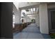 Covered walkway featuring stone columns, modern lighting, and smooth flooring creating an inviting pedestrian experience at 3440 Crystal Tower St, Las Vegas, NV 89129