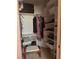 Organized walk-in closet features ample shelving and storage for clothes and accessories at 3551 Sagebrush Ave, Pahrump, NV 89048