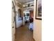 View of the foyer leading into the home featuring arched doorways and tile flooring at 3551 Sagebrush Ave, Pahrump, NV 89048