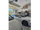 A spacious garage with car, tools, and storage at 3551 Sagebrush Ave, Pahrump, NV 89048