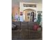 Inviting living room with a cozy sofa and unique architectural details at 3551 Sagebrush Ave, Pahrump, NV 89048