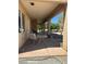 A covered outdoor patio with seating area at 3551 Sagebrush Ave, Pahrump, NV 89048