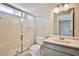 Bathroom featuring shower stall, vanity, and toilet with clean, neutral finishes at 3596 Bronco Rd, Las Vegas, NV 89103
