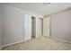 An empty bedroom with tile flooring and a closet at 3596 Bronco Rd, Las Vegas, NV 89103