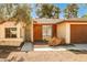 This is a charming single-story home with brick accents and drought resistant landscaping at 3596 Bronco Rd, Las Vegas, NV 89103
