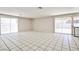 Spacious living room with large sliding doors providing ample natural light and patio access at 3596 Bronco Rd, Las Vegas, NV 89103