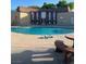 Inviting community pool and lounge area with table and chairs at 3692 Garden South Dr # 0, Las Vegas, NV 89121