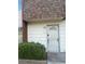 Home featuring front door with security gate, and a well-manicured bush at 3692 Garden South Dr # 0, Las Vegas, NV 89121