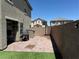 Private backyard features a brick patio, well-maintained wall, and built-in BBQ at 3855 Park Field Dr, Las Vegas, NV 89120
