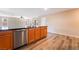 This kitchen has stainless appliances and wooden cabinets with an island sink at 3855 Park Field Dr, Las Vegas, NV 89120