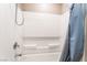 White tub and shower with shower curtain and built in shelves at 3855 Park Field Dr, Las Vegas, NV 89120