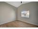 Light-filled bedroom with hardwood floors, ceiling fan, and neutral colors at 4010 Herblinda Ln, North Las Vegas, NV 89032