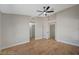 Well-lit bedroom with wood floors and convenient access to closets at 4010 Herblinda Ln, North Las Vegas, NV 89032