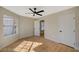 Bedroom boasts new flooring, a ceiling fan, and lots of natural light at 4010 Herblinda Ln, North Las Vegas, NV 89032