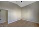 Open bedroom layout with light hardwood floors and adjoining doorway at 4010 Herblinda Ln, North Las Vegas, NV 89032