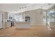 Bright kitchen boasts stainless appliances, a large island with white cabinets, recessed lights, and an open layout at 4010 Herblinda Ln, North Las Vegas, NV 89032