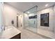 Modern bathroom featuring glass shower with marble surround, rain shower, and marble bench at 461 Highview Ridge Ave, Las Vegas, NV 89138