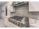 Gourmet kitchen with premium range and stainless steel hood at 461 Highview Ridge Ave, Las Vegas, NV 89138