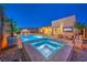 Tranquil backyard oasis featuring a hot tub with pool, bar, and outdoor television at 461 Highview Ridge Ave, Las Vegas, NV 89138