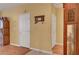 Welcoming entryway with light yellow walls, white trim, and beautiful wood-look laminate flooring at 4802 Regalo Bello St, Las Vegas, NV 89135
