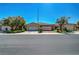 Charming single-story home features a tile roof, a two-car garage and low maintenance landscaping at 4802 Regalo Bello St, Las Vegas, NV 89135