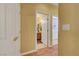 Hallway view showing access to the bathroom and laundry area enhancing the home's functional design at 4802 Regalo Bello St, Las Vegas, NV 89135
